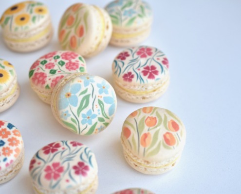Assorted spring French macarons with floral designs