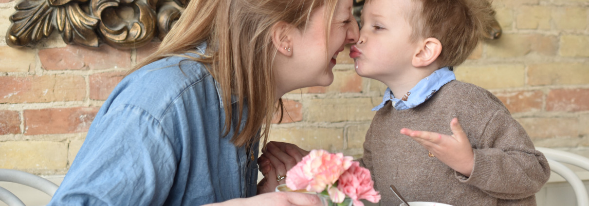 Mother and son spending time together at Le Bon Macaron in Grand Rapids Michigan