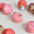 Beautiful and colorful French macarons for Valentine's Day decorated with sprinkles.